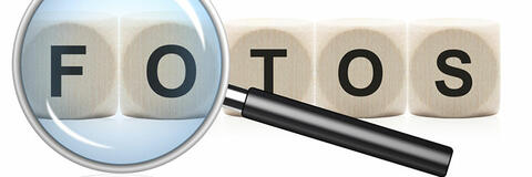 Lupe vor Würfeln mit Buchstaben (Quelle: © Torbz - fotolia.com) Lupe vor Würfeln mit Buchstaben (Quelle: fotolia.de)