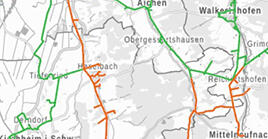 Kartenausschnitt von Bayern mit grün und orange eingefärbten Stromleitungen (Quelle: Energie-Atlas Bayern) Beispiel-Kartenausschnitt Stromnetz-Kapazitäten (Quelle: Energie-Atlas Bayern)