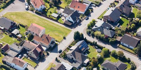 Luftbildaufnahme einer Wohnsiedlung (Quelle: Christian Schwier - Fotolia.com).